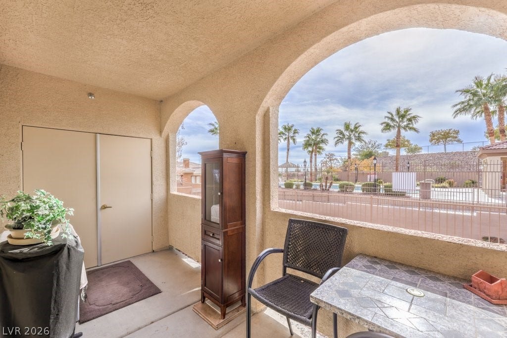 3910 Legend Hills Street, #103, Las Vegas, NV 89129 Beautiful Cover Patio area with closet for storage. Great view of the 2nd pool.
