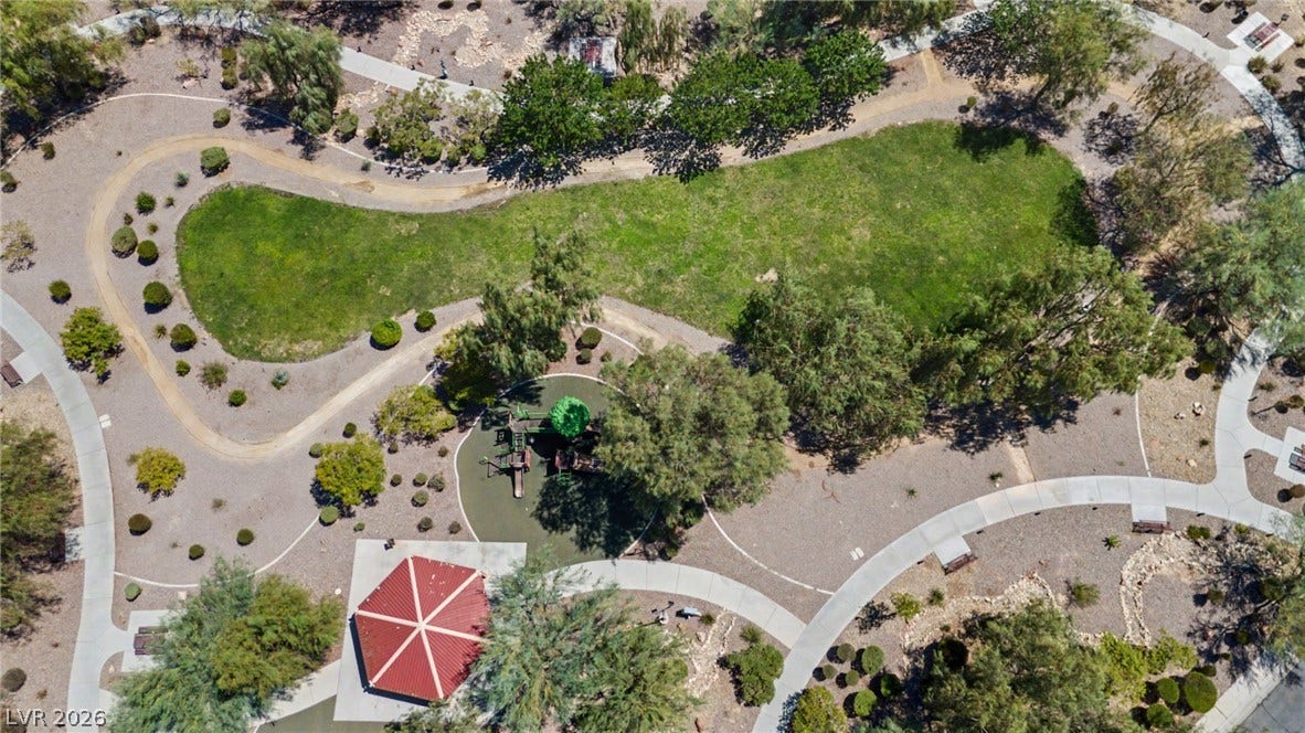 6025 Glenborough Street, North Las Vegas, NV 89115 An aerial view showcases meticulously landscaped common areas complete with walking paths and community green spaces.