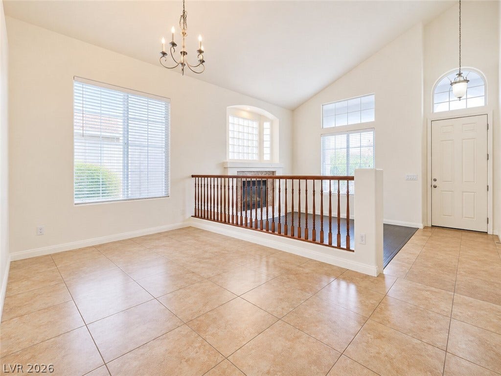 669 Doubleshot Lane, Henderson, NV 89052 Vaulted ceilings and tile flooring enhance this open entrance foyer and living space.