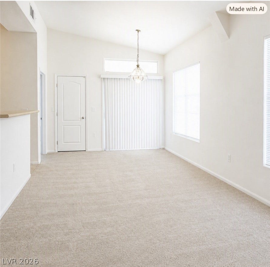 2305 W Horizon Ridge Parkway, #4024, Henderson, NV 89052 Vaulted ceilings and soft carpeting define this inviting open dining area.