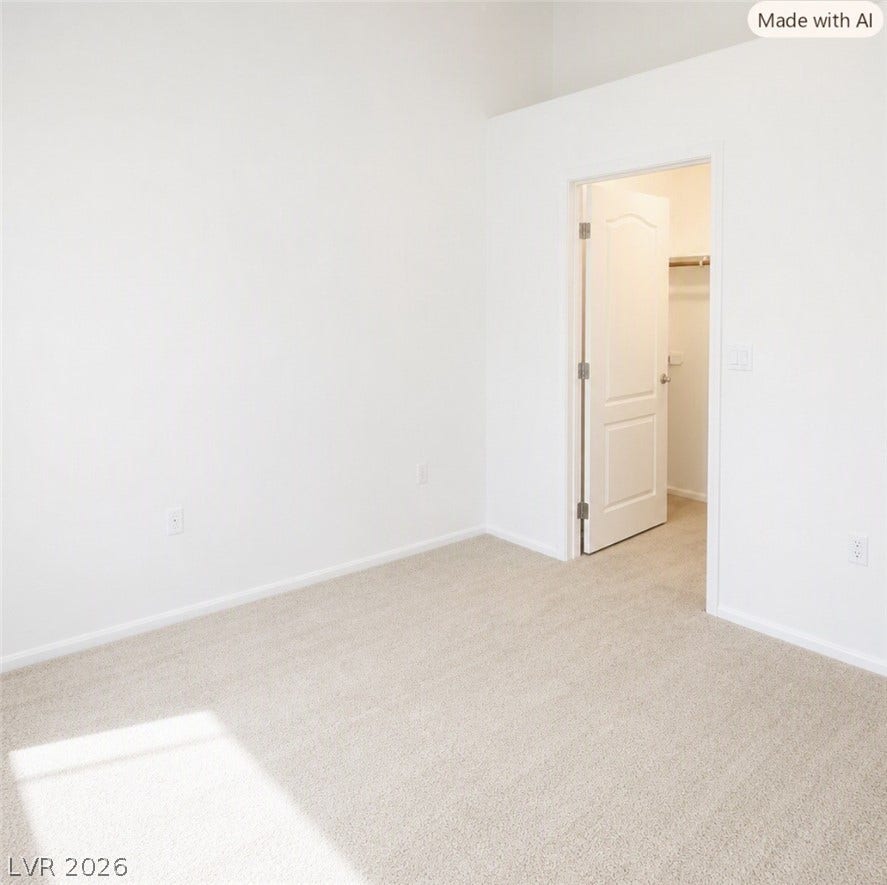2305 W Horizon Ridge Parkway, #4024, Henderson, NV 89052 Soft carpeting pairs with neutral walls in this bedroom featuring a walk-in closet.