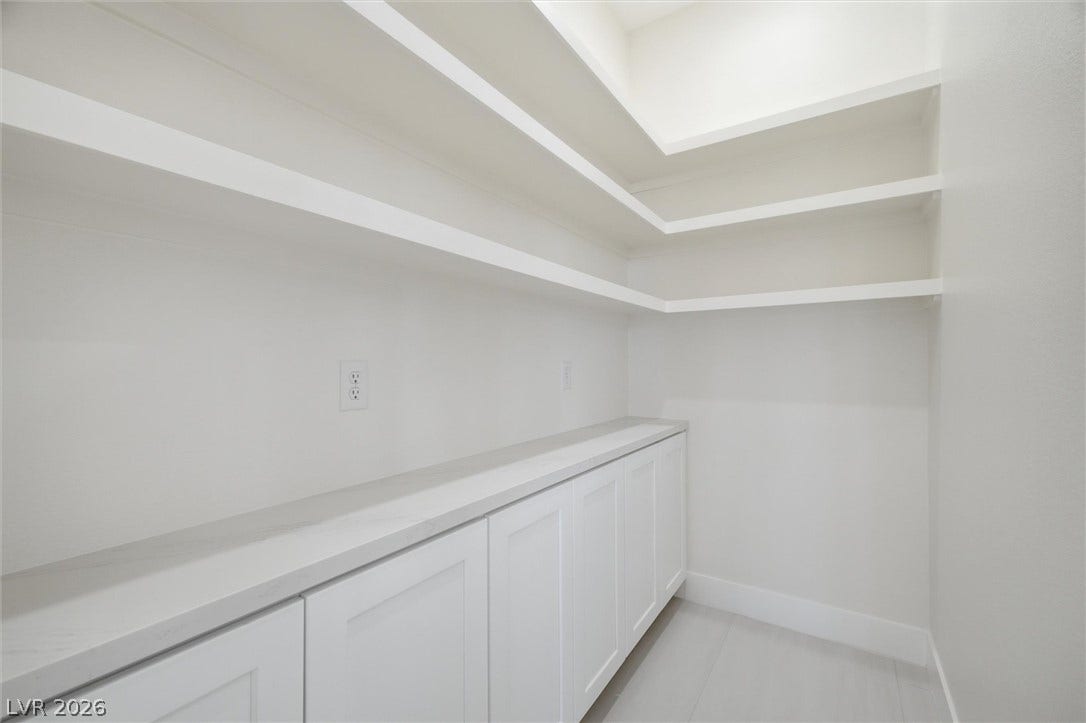 5910 E Kellogg Road, Pahrump, NV 89061 Ample built-in shelving and low cabinetry provide efficient storage options.