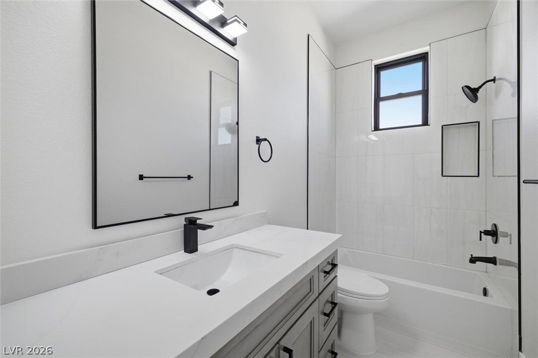 5910 E Kellogg Road, Pahrump, NV 89061 Clean lines and modern fixtures define this contemporary bathroom with integrated tub and shower.