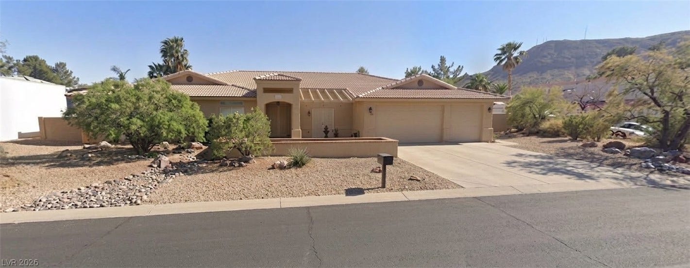 211 W Highland Drive, Henderson, NV 89015 fornt of home AI generated to remove cars.