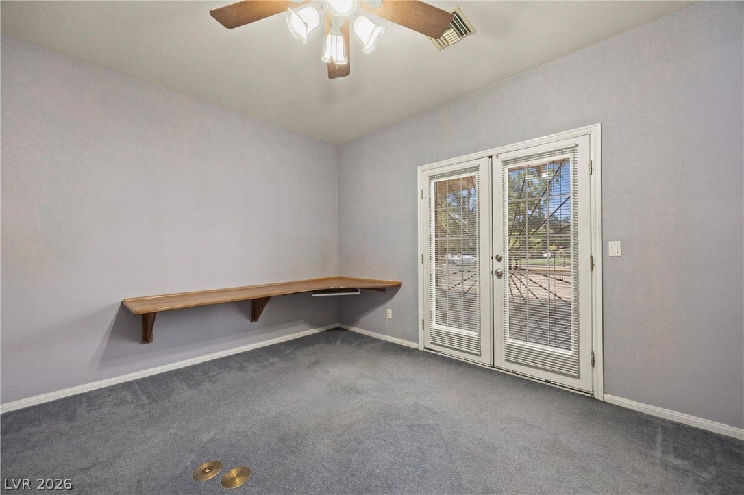 211 W Highland Drive, Henderson, NV 89015 Front office/bedroom. Build in desk. Door to the outside of home