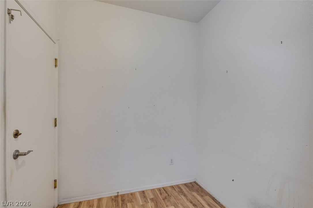 Clean lines and durable wood flooring define this versatile corner space.