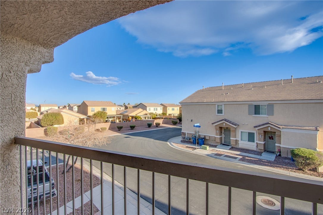 6717 Lookout Lodge Lane, #1, North Las Vegas, NV 89084 An elevated perspective overlooks the quiet residential street and surrounding neighborhood.