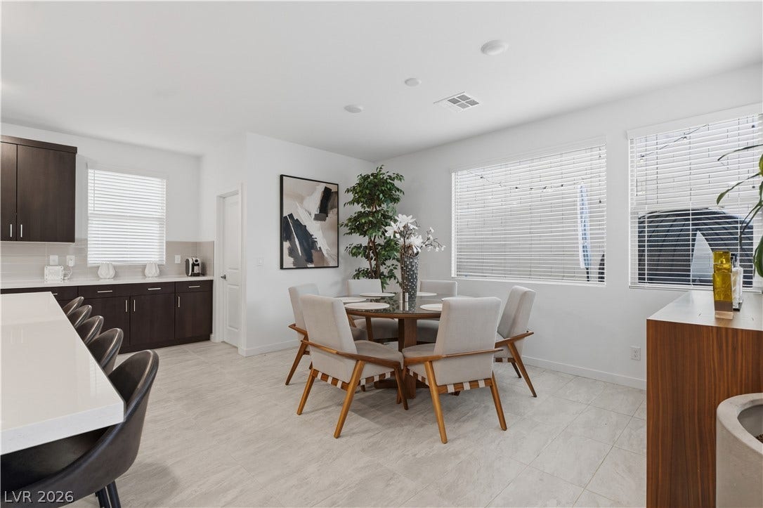 544 Front Range Lane, North Las Vegas, NV 89084 Clean lines and light flooring define this open dining space adjacent to the kitchen.