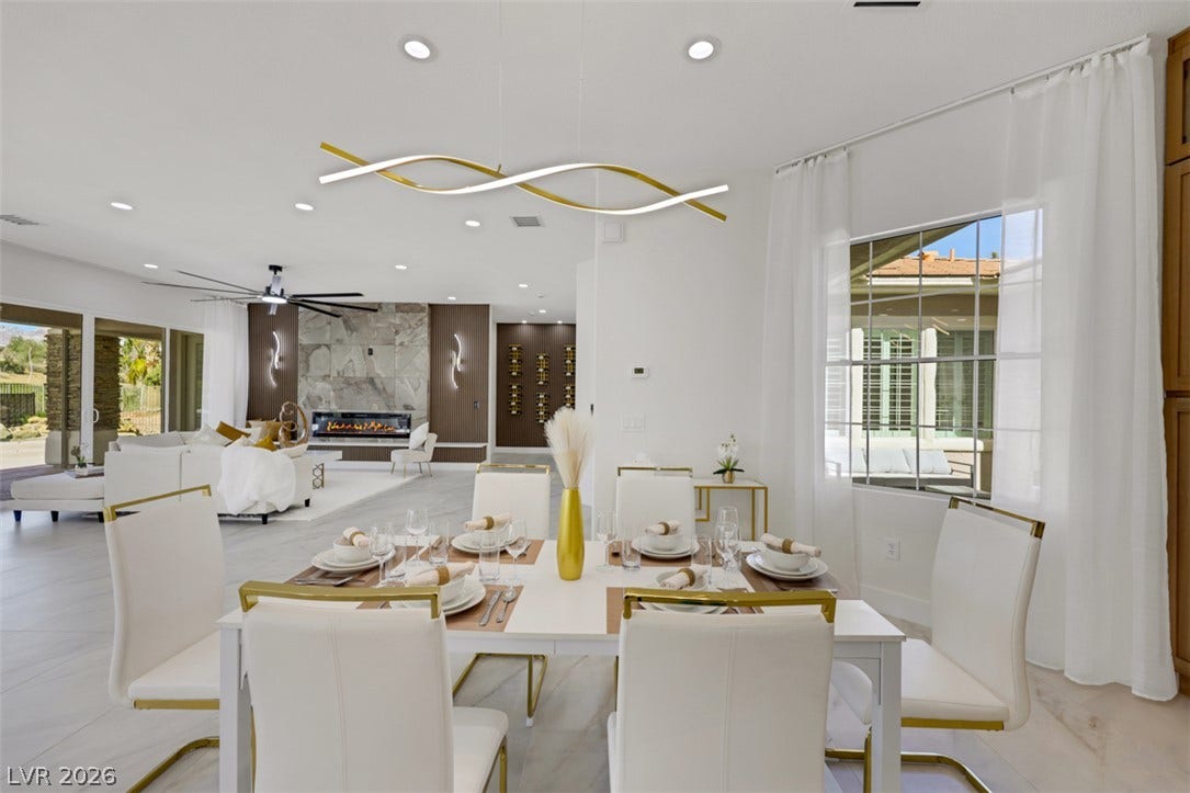 5015 Rivedro Street, Las Vegas, NV 89135 An open layout flows effortlessly from the dining area into the light-filled main living space.