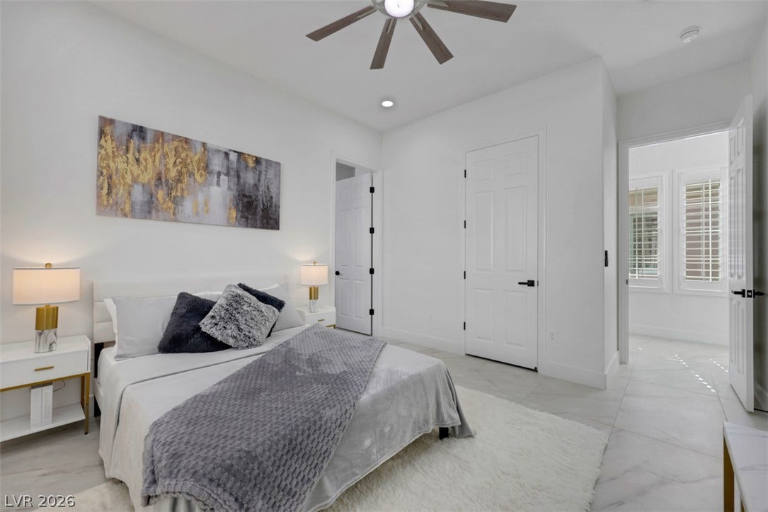 5015 Rivedro Street, Las Vegas, NV 89135 Polished tile flooring and clean architectural lines define this serene, modern sleeping space.