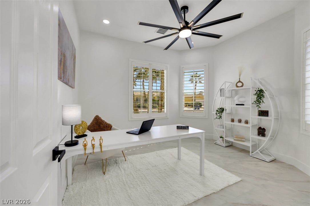5015 Rivedro Street, Las Vegas, NV 89135 High ceilings and plantation shutters enhance this quiet work space.