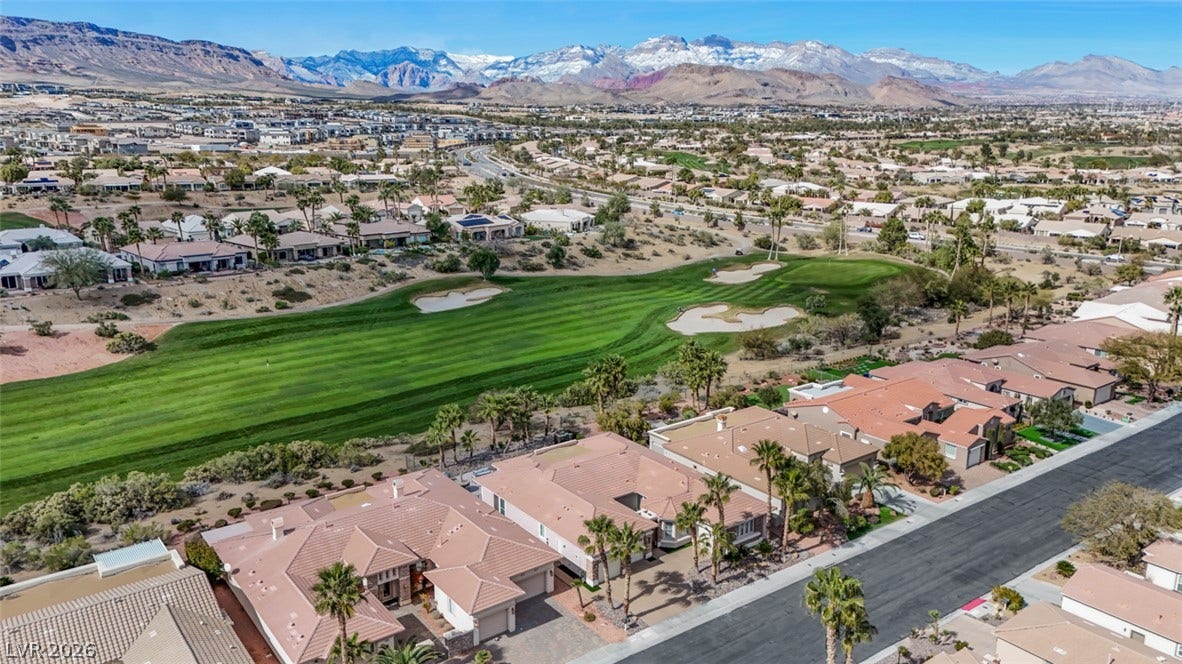 5015 Rivedro Street, Las Vegas, NV 89135 Majestic snow-capped mountain peaks frame this expansive desert golf course community.