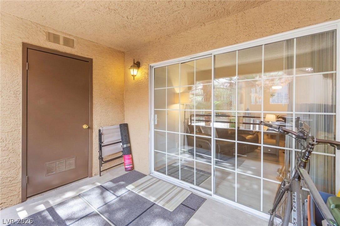 2200 S Fort Apache Road, #2156, Las Vegas, NV 89117 A private patio space with convenient direct access to the interior and outdoor storage.