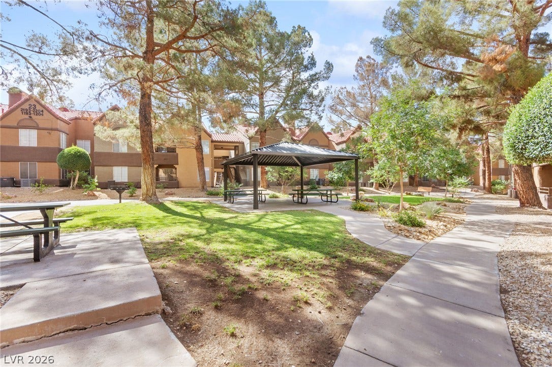 2200 S Fort Apache Road, #2156, Las Vegas, NV 89117 A community green space with a shaded gazebo provides a serene outdoor retreat.
