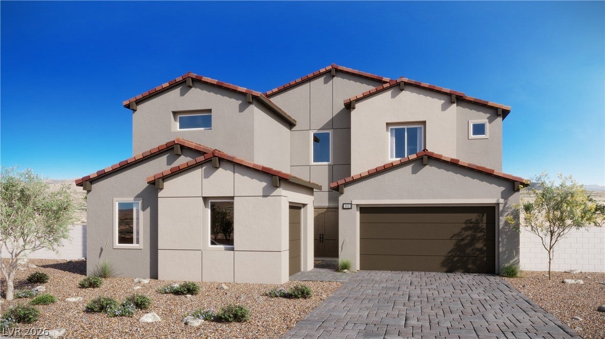 9941 Baron Ridge Street, Las Vegas, NV 89141 Spanish tile accents and a paved driveway enhance this contemporary two-story home facade.