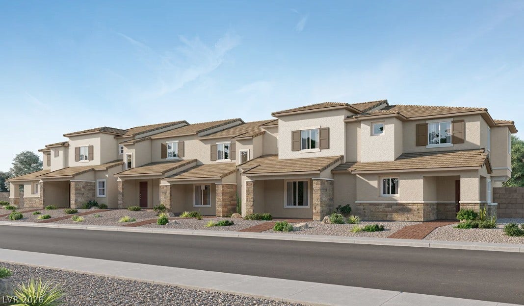 Stucco and stone veneer exterior detailing defines this modern multi-family building design.