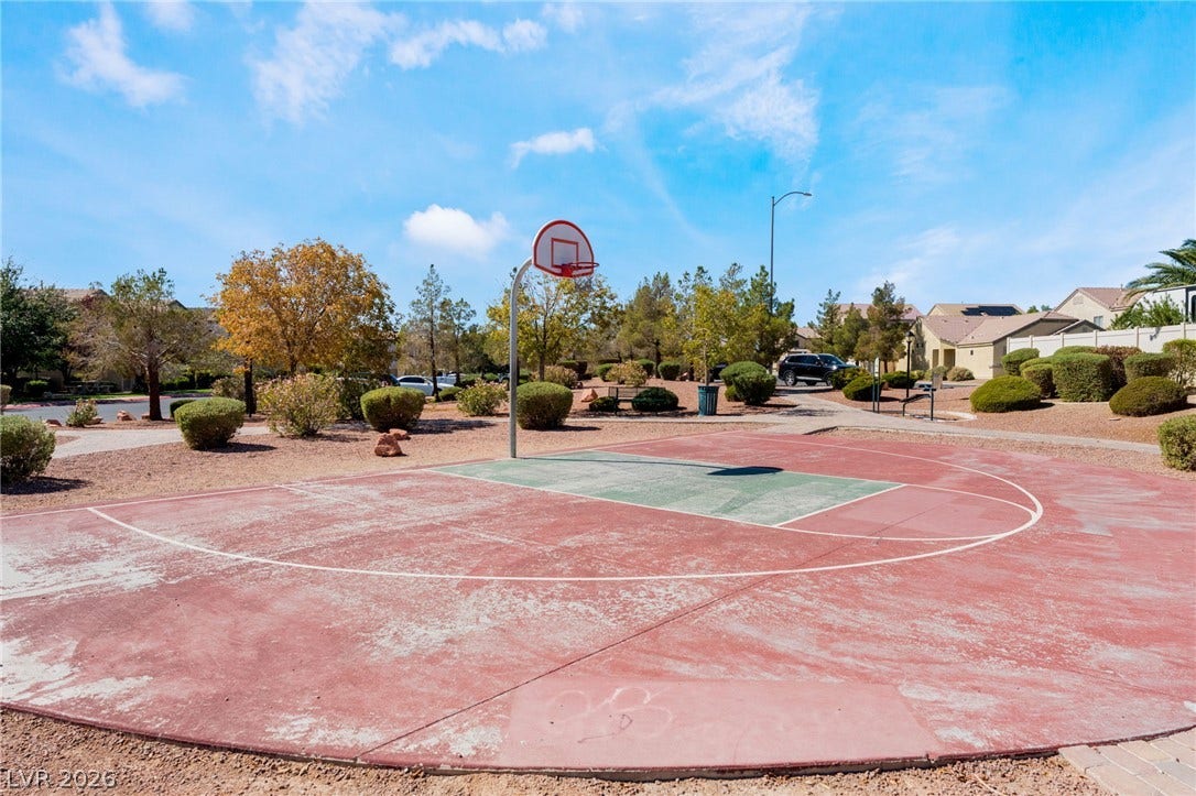 6527 Velvet Silk Street, North Las Vegas, NV 89084 An outdoor neighborhood basketball court provides recreational space just steps from the homes.