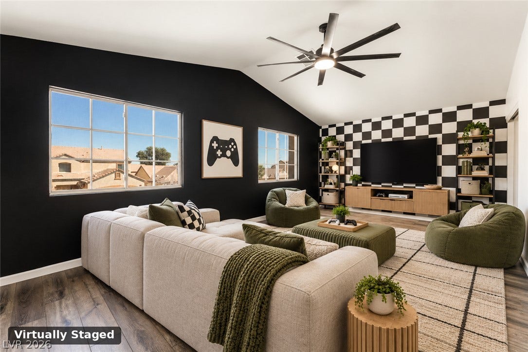6527 Velvet Silk Street, North Las Vegas, NV 89084 Virtually staged - the loft area features plenty of room to be used as a flex space - bedroom, living room, theater room, office. The possibilities are endless.