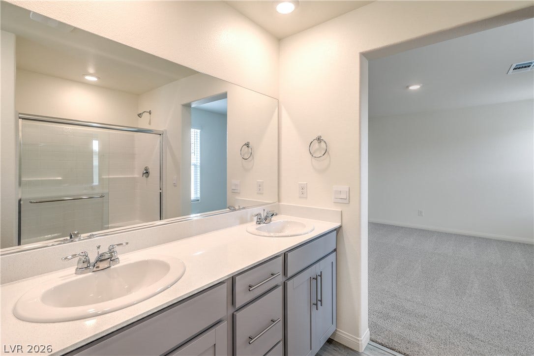 1208 Sun Parakeet Drive, Henderson, NV 89011 Photos are of the model home, actual finishes may vary.