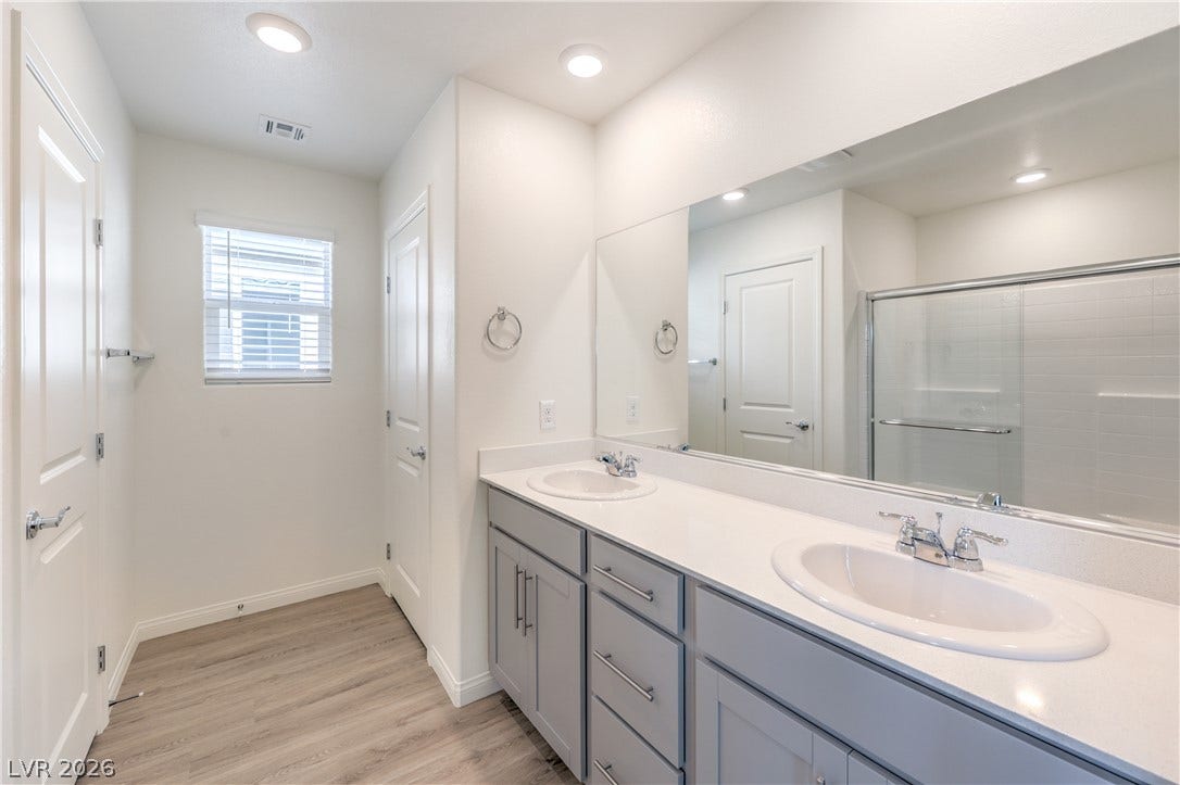 1208 Sun Parakeet Drive, Henderson, NV 89011 Photos are of the model home, actual finishes may vary.