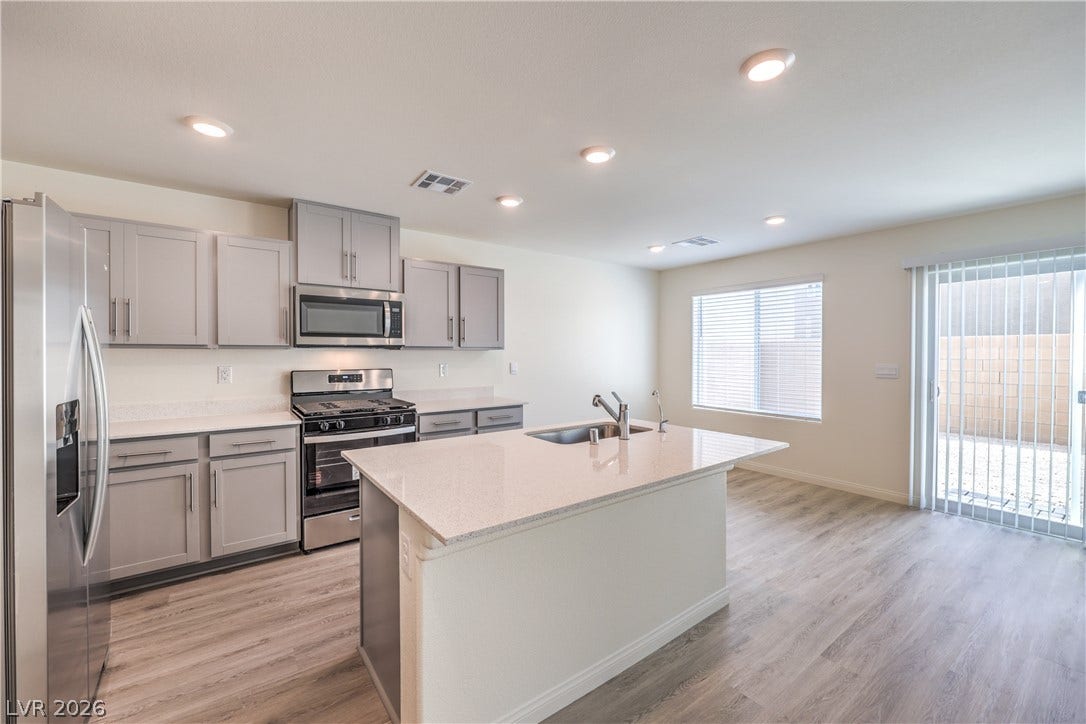 1208 Sun Parakeet Drive, Henderson, NV 89011 Photos are of the model home, actual finishes may vary.