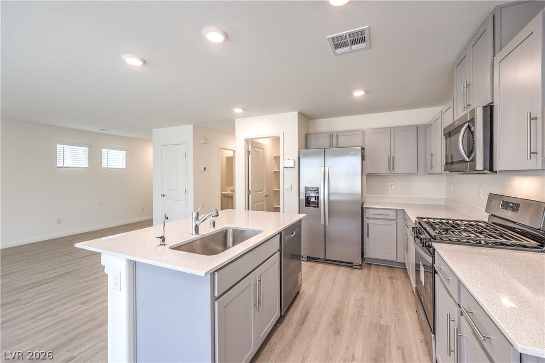 1208 Sun Parakeet Drive, Henderson, NV 89011 Photos are of the model home, actual finishes may vary.