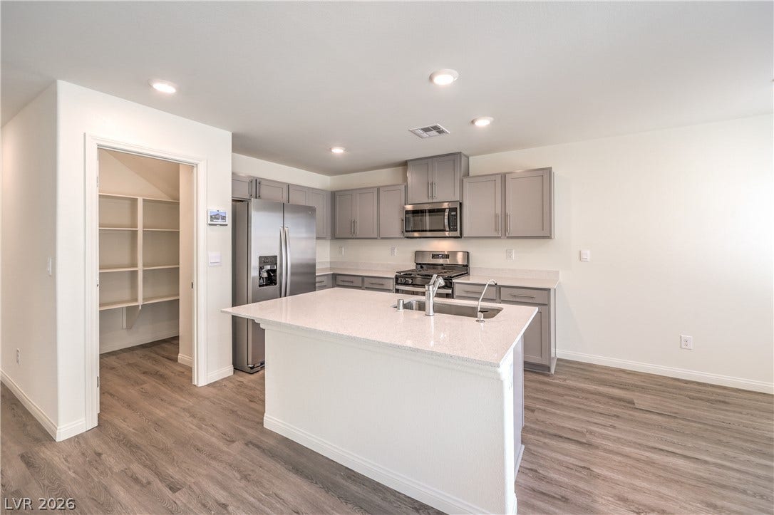 1208 Sun Parakeet Drive, Henderson, NV 89011 Photos are of the model home, actual finishes may vary.
