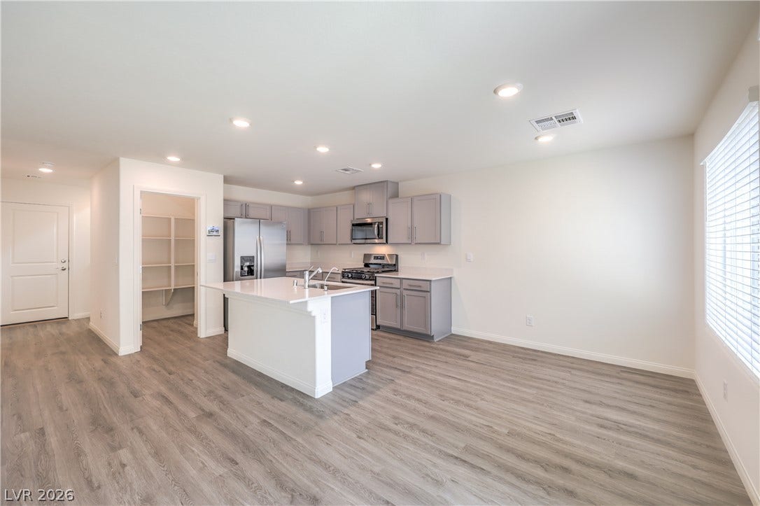 1208 Sun Parakeet Drive, Henderson, NV 89011 Photos are of the model home, actual finishes may vary.