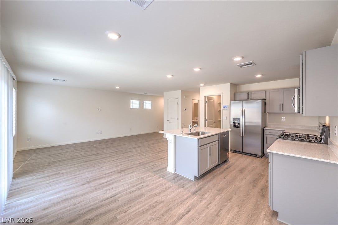 1208 Sun Parakeet Drive, Henderson, NV 89011 Photos are of the model home, actual finishes may vary.