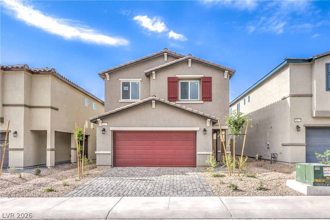 1208 Sun Parakeet Drive, Henderson, NV 89011 Photos are of the model home, actual finishes may vary.