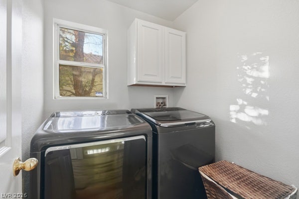 9726 Sweet Jasmine Drive, Las Vegas, NV 89148 Natural light streams through a window into this functional utility space with overhead cabinetry.