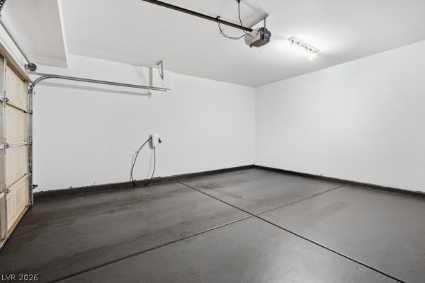 9726 Sweet Jasmine Drive, Las Vegas, NV 89148 An electric vehicle charger and automatic opener complete this finished garage.