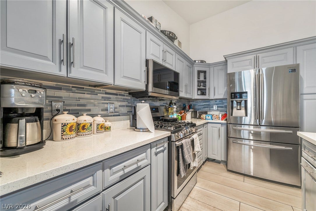 125 Heather Drive, Henderson, NV 89002 Modern cabinetry and stone countertops elevate this kitchen design.