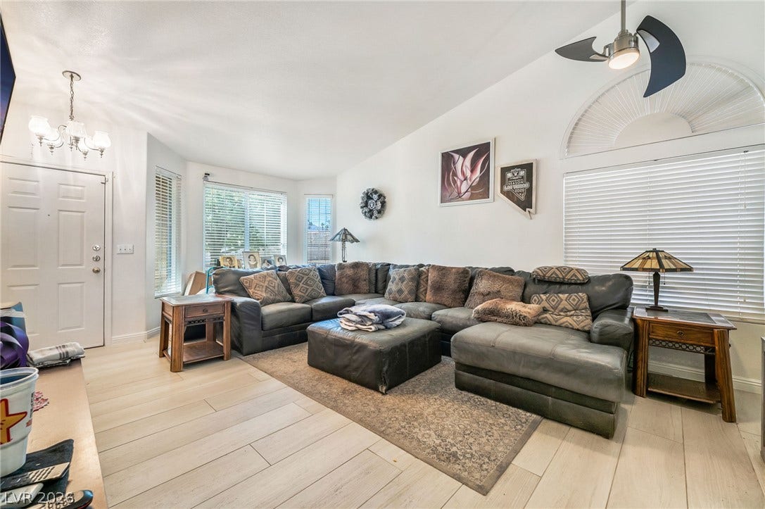 125 Heather Drive, Henderson, NV 89002 Angled ceilings and light plank flooring create an airy atmosphere in this inviting space.