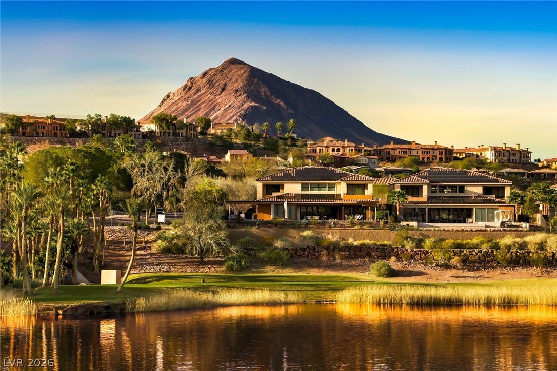 30 Strada Di Villaggio, #151, Henderson, NV 89011 Dramatic mountain vistas rise above custom luxury estates lining the tranquil golf course lake.