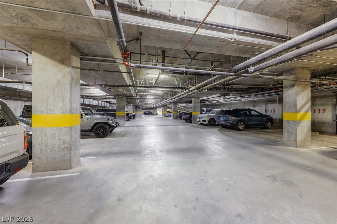 30 Strada Di Villaggio, #151, Henderson, NV 89011 Secure underground parking features robust concrete construction and clearly marked spaces.
