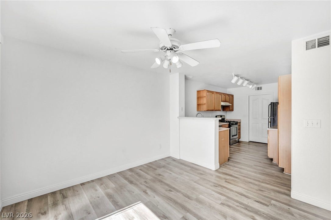 511 Armenian Place, Henderson, NV 89052 Smooth vinyl floors connect this versatile dining area directly to the kitchen.