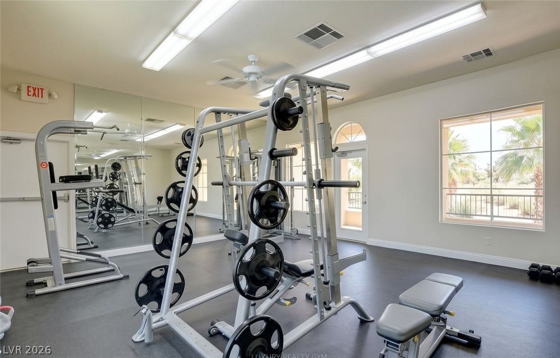 7173 S Durango Drive, #212, Las Vegas, NV 89113 Generous natural light streams through wide windows into this spacious home fitness room.
