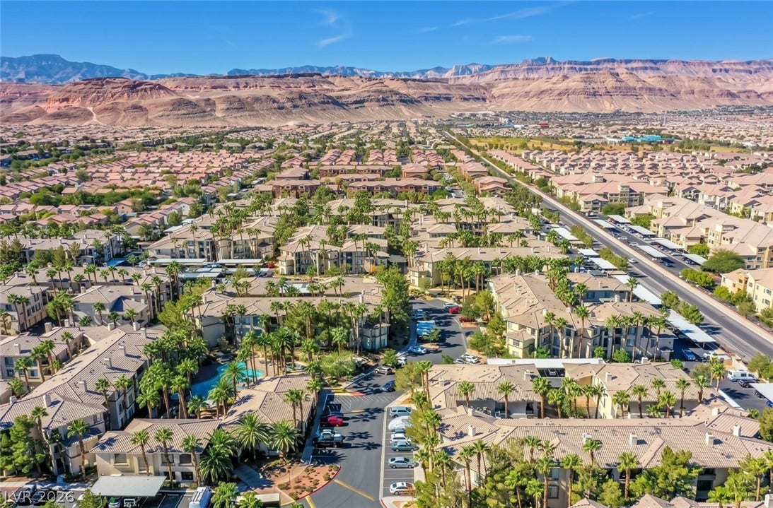7173 S Durango Drive, #212, Las Vegas, NV 89113 Dramatic mountain vistas frame this sprawling residential community surrounded by desert ridges.