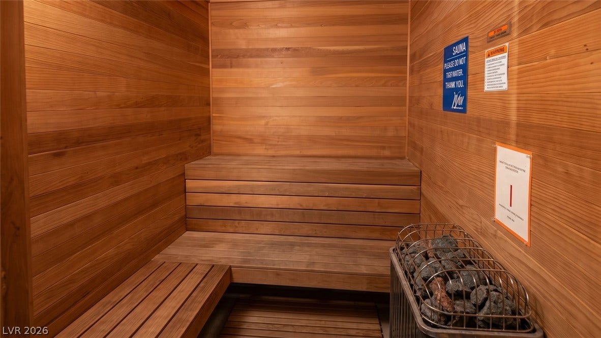 7173 S Durango Drive, #212, Las Vegas, NV 89113 Warm wood paneling wraps this private home sauna featuring multi-level bench seating.