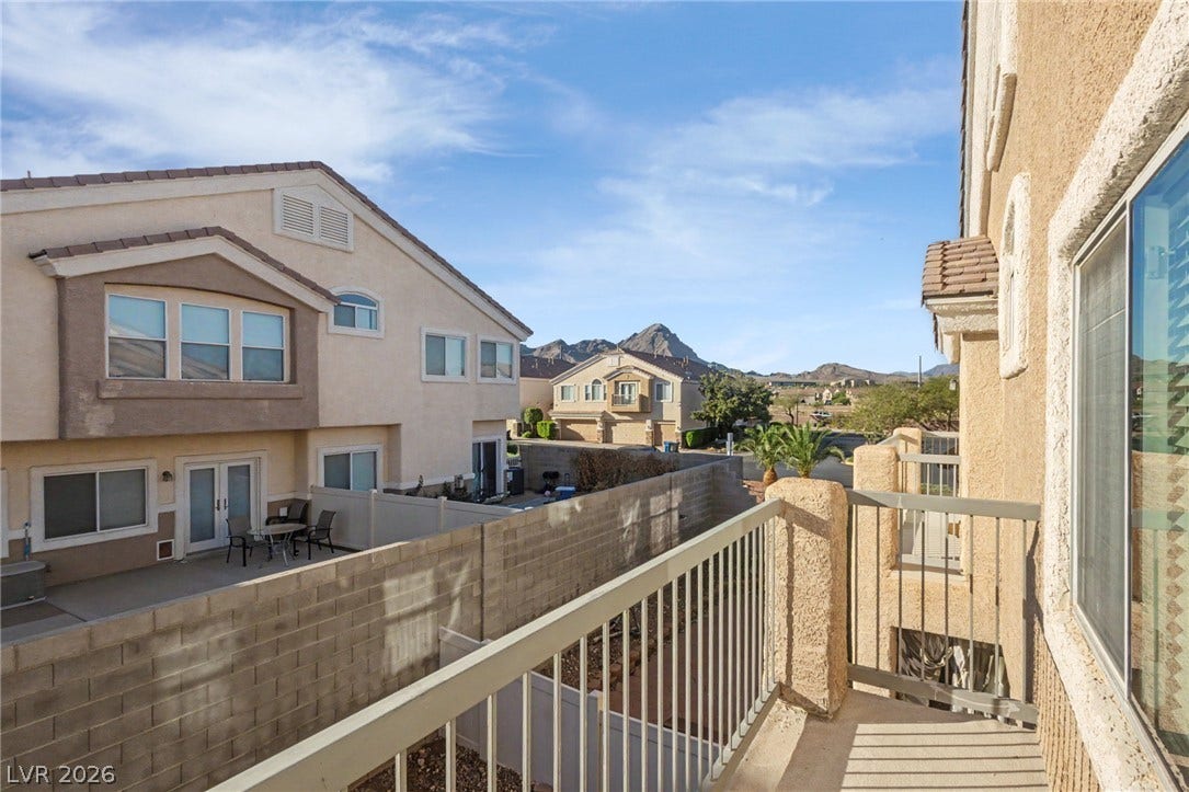 1555 Ward Frontier Lane, Henderson, NV 89002 Distant mountain peaks rise beyond the neighborhood, visible from this elevated outdoor vantage point.