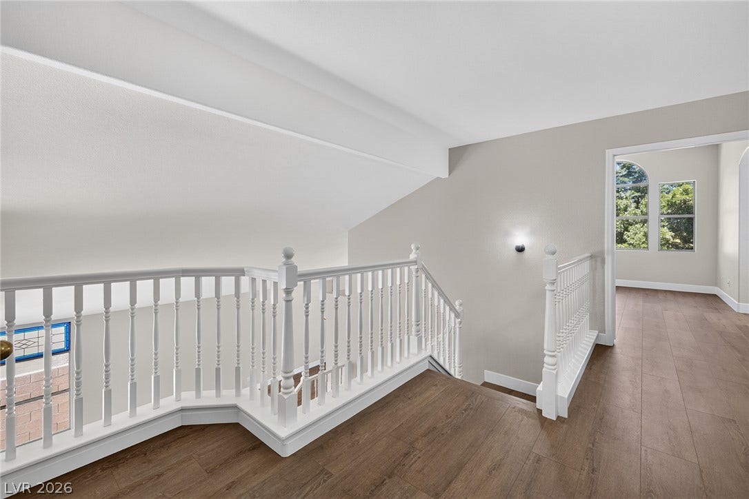A well-lit landing provides access to three upstairs bedrooms.