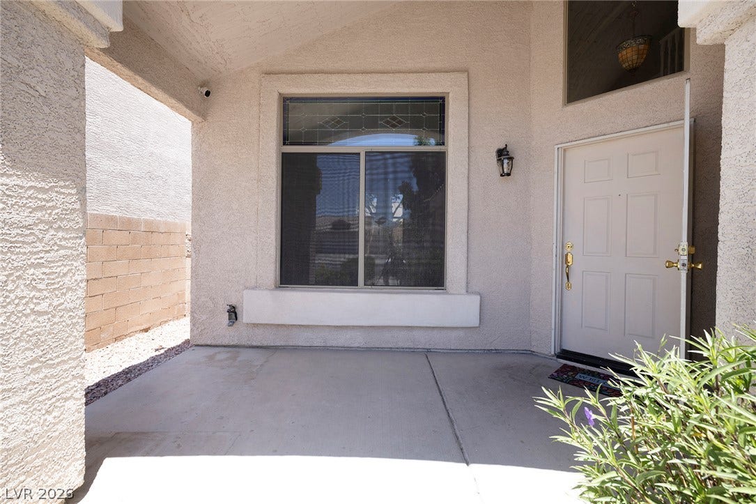 A spacious covered Front Porch provides a welcoming entry.