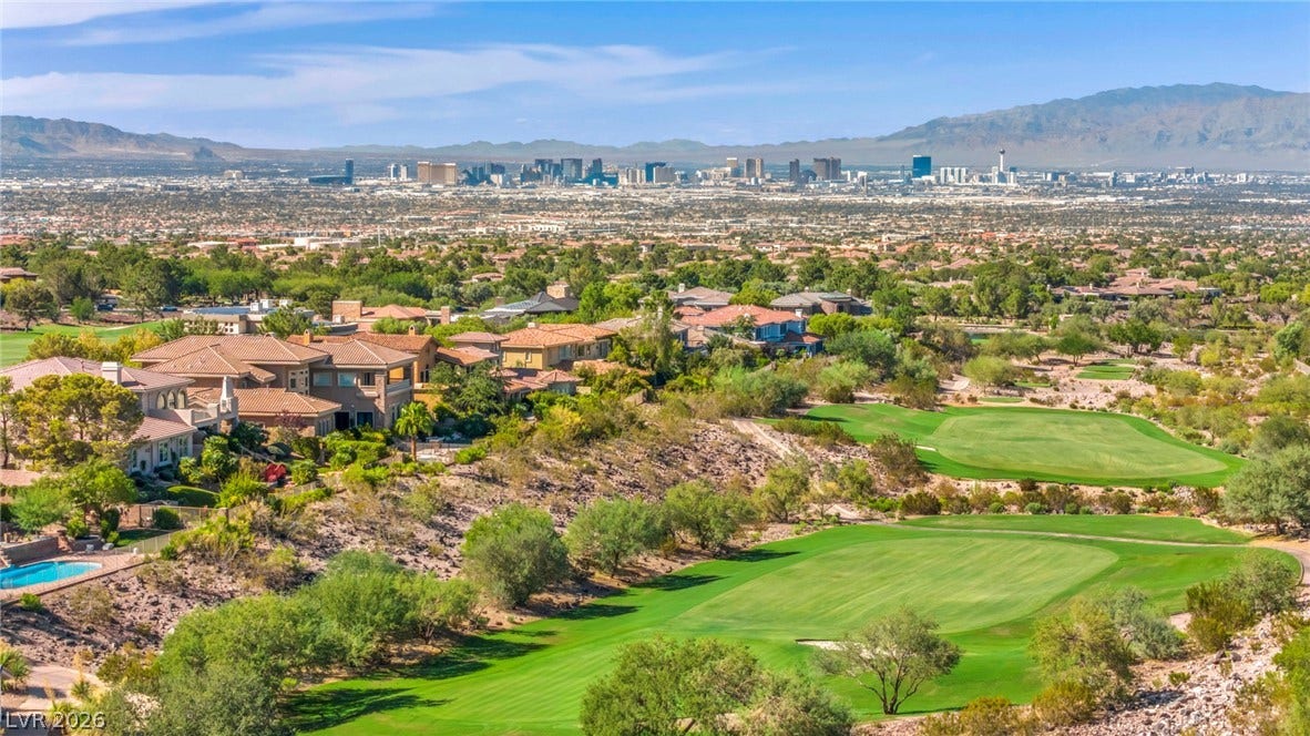 37 Stonemark Drive, Henderson, NV 89052 Bird's eye view featuring view of golf course, a city view, and a mountain view