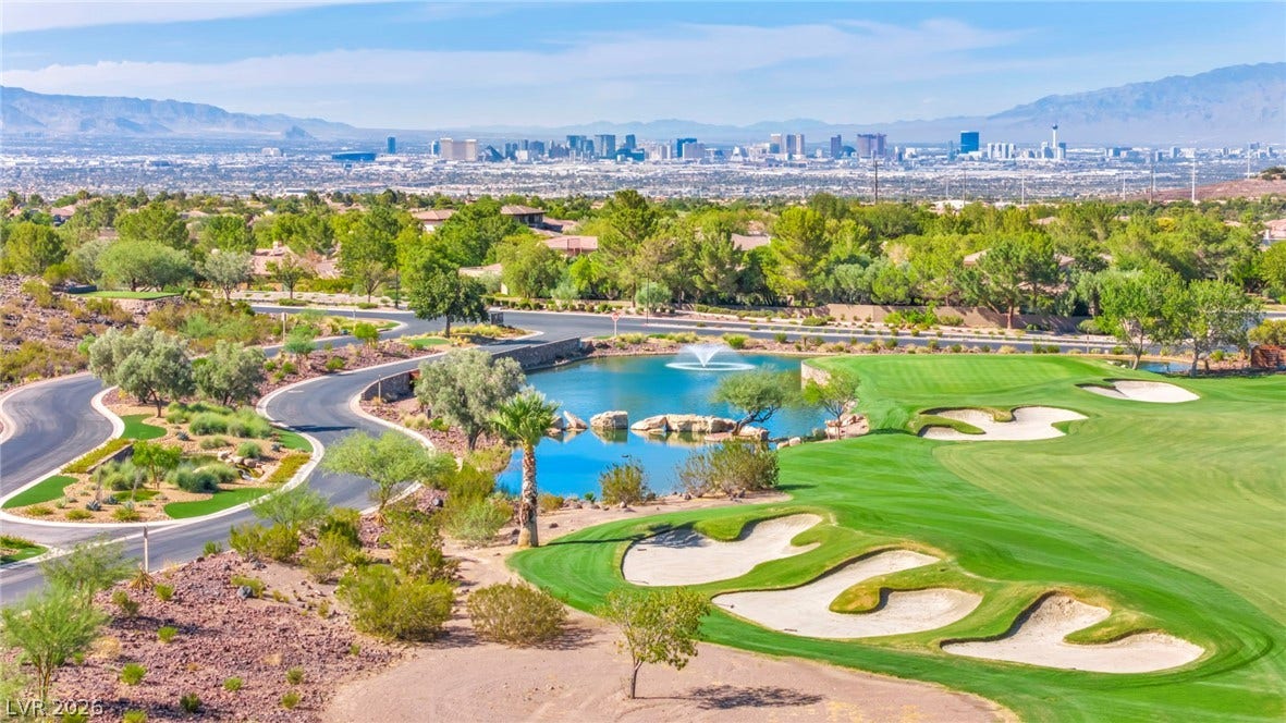 37 Stonemark Drive, Henderson, NV 89052 Bird's eye view with golf course view, a view of city, and a water and mountain view