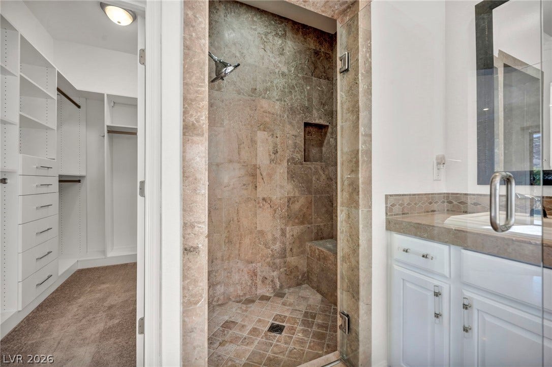 37 Stonemark Drive, Henderson, NV 89052 Full bath featuring a shower stall, vanity, and a spacious closet