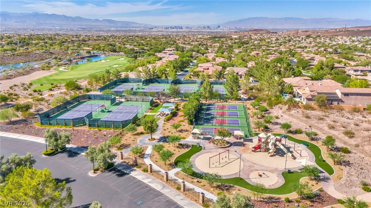 37 Stonemark Drive, Henderson, NV 89052 Aerial view featuring a water and mountain view, a residential view, and view of golf course