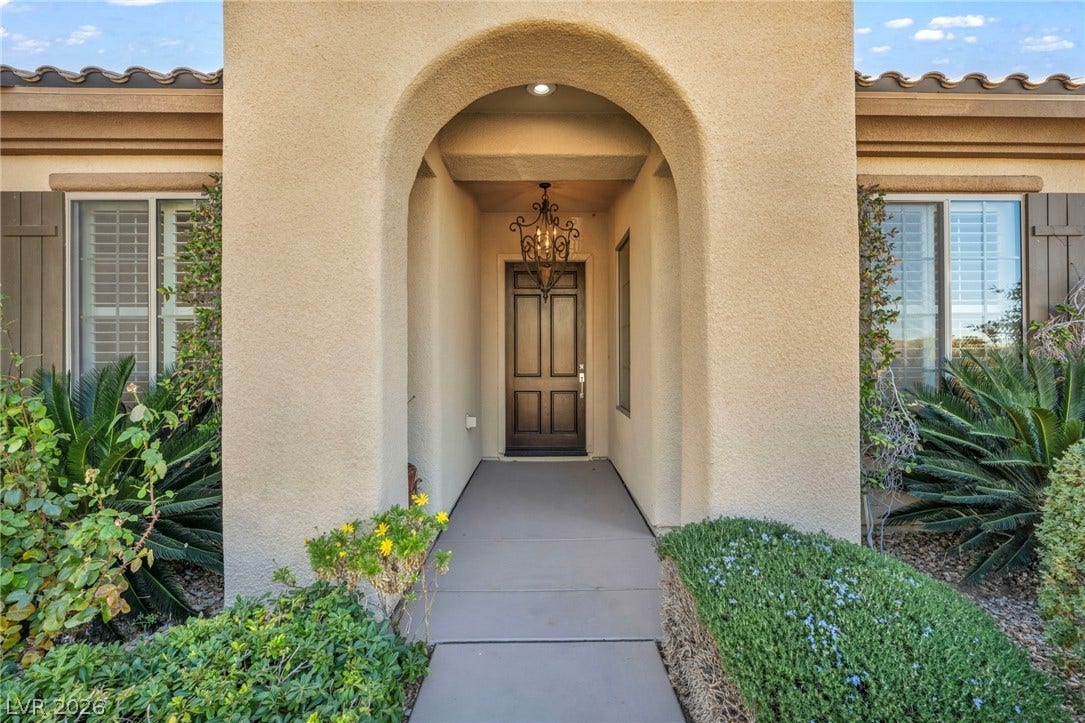 37 Stonemark Drive, Henderson, NV 89052 View of exterior entry featuring stucco siding