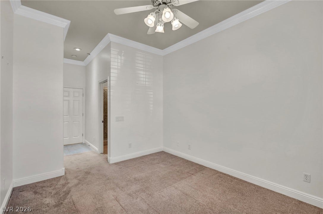 37 Stonemark Drive, Henderson, NV 89052 Carpeted empty room with ornamental molding, ceiling fan, recessed lighting, and baseboards
