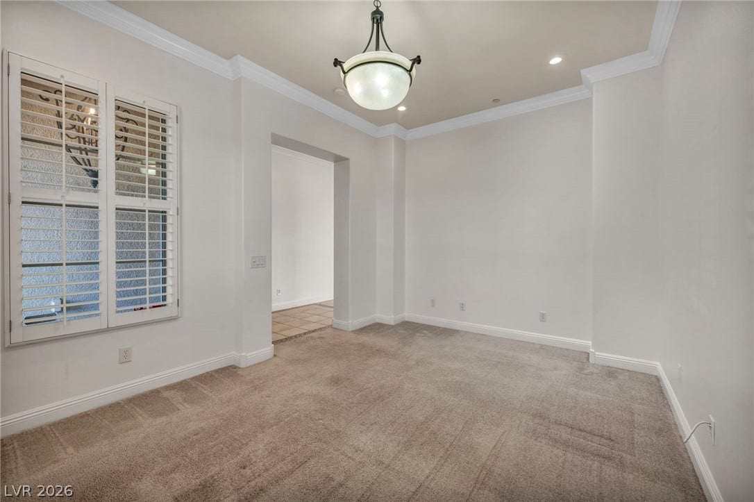 37 Stonemark Drive, Henderson, NV 89052 Carpeted spare room featuring crown molding, baseboards, and recessed lighting